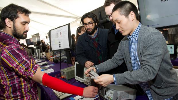 Student testing a project at NYU Tandon's Research Expo
