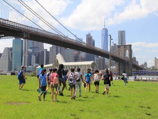 students participating in the data collecting soundwalk under the Brooklyn Bridge 