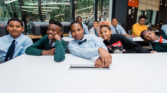 young Black students in makerspace