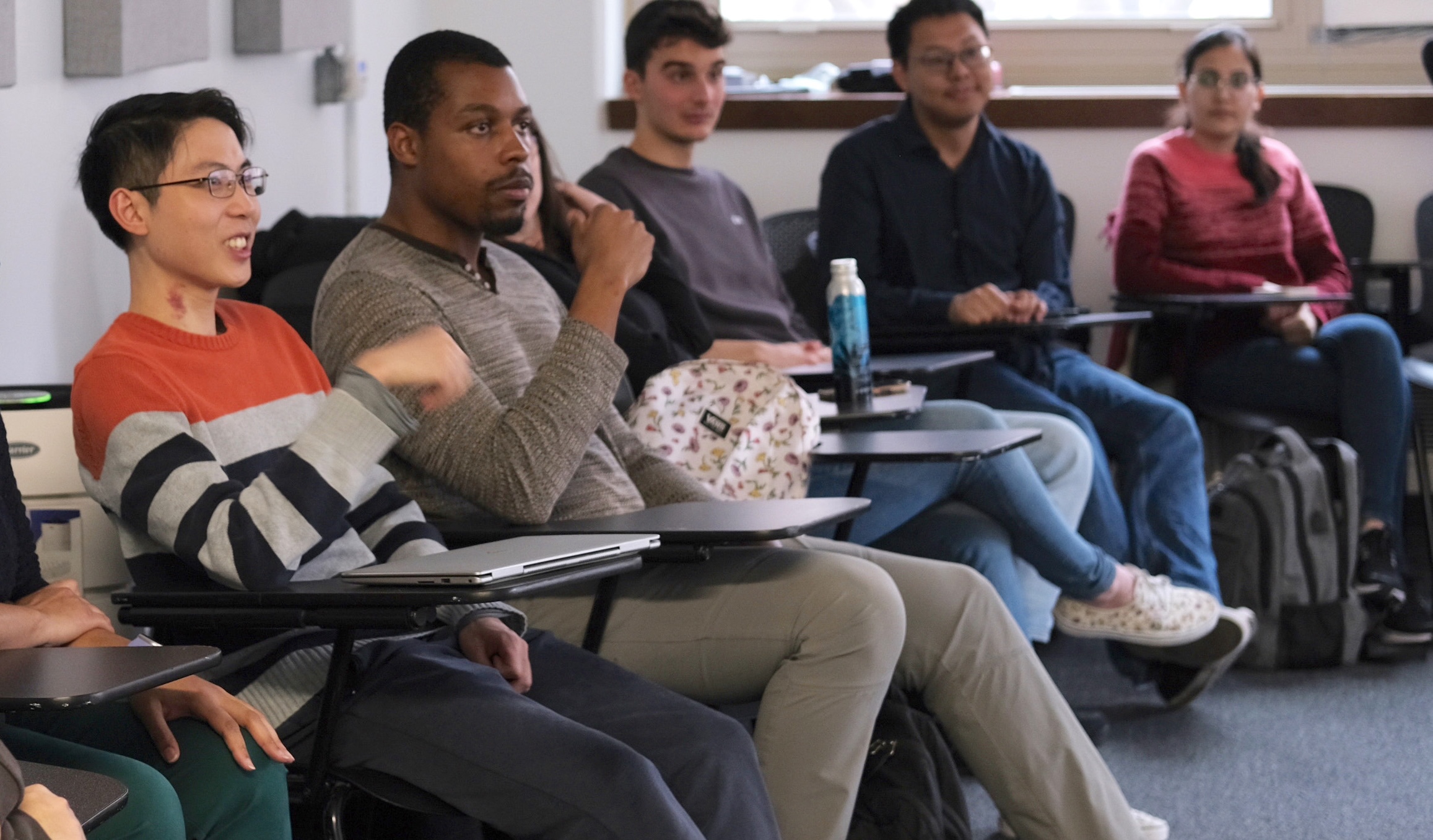 Doctoral students sitting in classroom