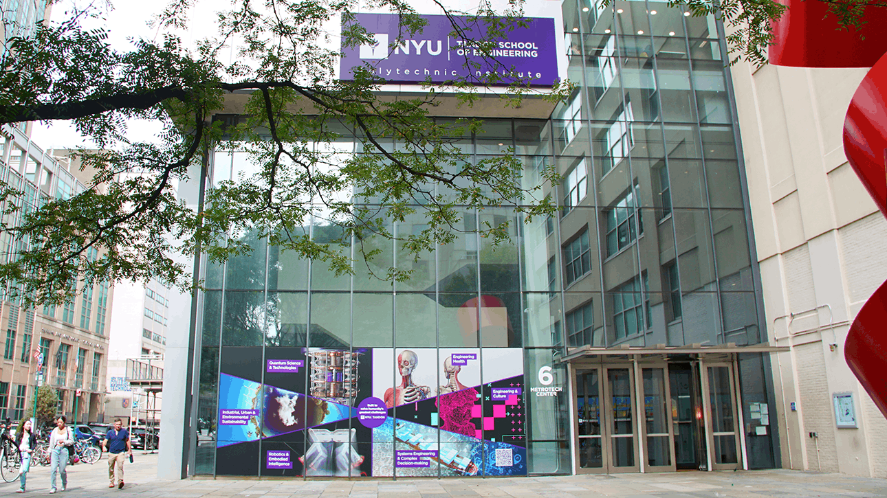 campus building with Tandon branded vinyls showing our 6 areas of impact