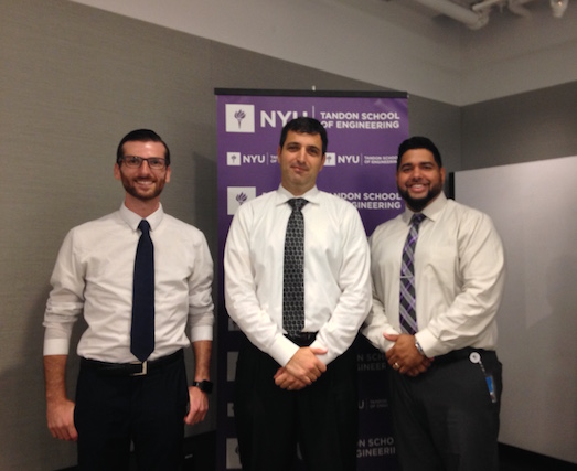  Mikhail Falkovich (center), director of information technology at Con Edison, flanked by NYU Tandon alumni and Con Edison analysts Eric Levenstein and Rafael Oquendo 