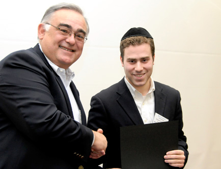 Michael LoJoie presents Benjamin Kanner with the second-place prize