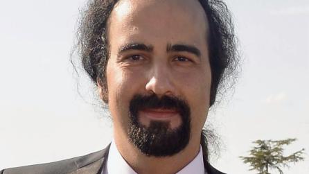 Headshot of Alper Erturk