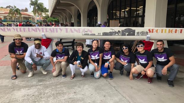 The Tandon Concrete Canoe team poses with their top-five placing vessel. 
