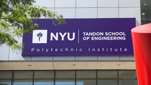 Purple NYU Tandon School of Engineering sign on building