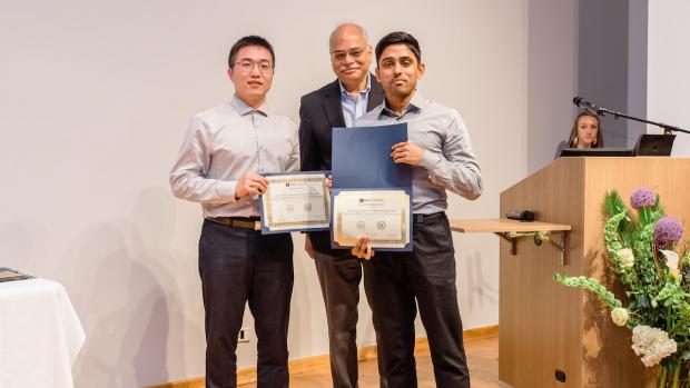 Arun holding Dante Youla Award for Graduate Research Excellence