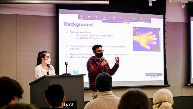 students giving a presentation at the NYU Prototyping Fund Showcase
