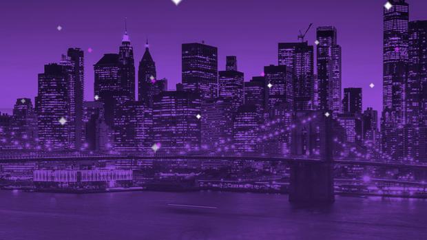 NYC skyline at night in purple