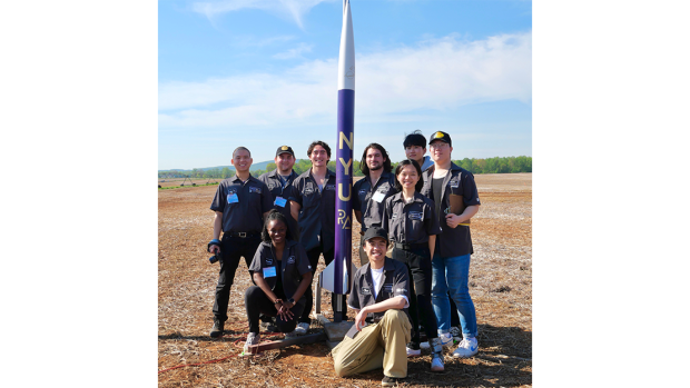 Rogue aerospace VIP members in front of their award winning rocket