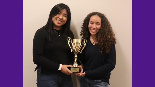 Grace Chang and Andrea González holding their Brad Smith Memorial Tournament semifinals trophy