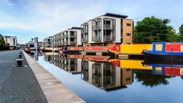 Canal with apartment buildings in the background