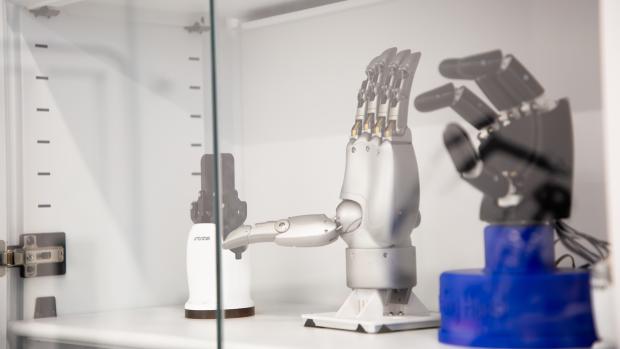Robotic hands sitting on a shelf