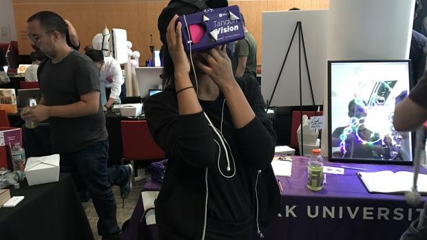 NYC Media Lab Summit attendee testing out a mobile VR application