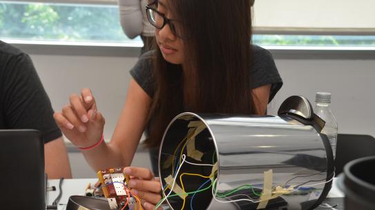student building an IoT device