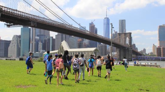 students participating in the data collecting soundwalk under the Brooklyn Bridge 