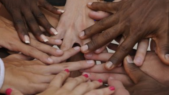 picture of multiethnic hands in a circle