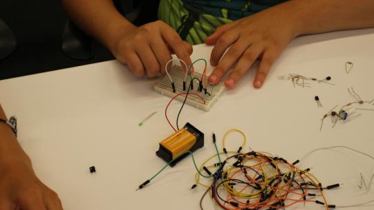 Student working with a breadboard