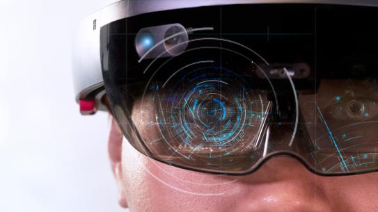 a close up of a person wearing an AR headset