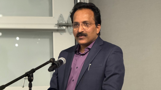 Dr. S. Somanath speaking into a microphone