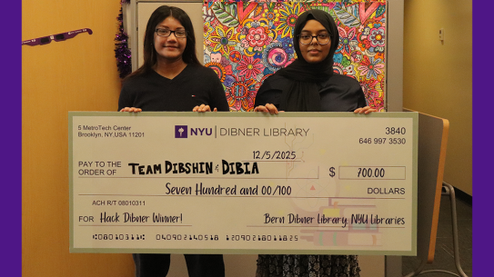 Noshin Siddiq and Alia Khan holding oversized check for $700