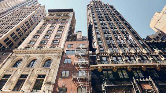 Low angle picture of New York buildings during the day