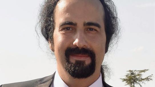 Headshot of Alper Erturk