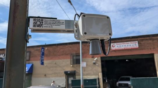 FloodNET Sensor attached to a telephone pole. 
