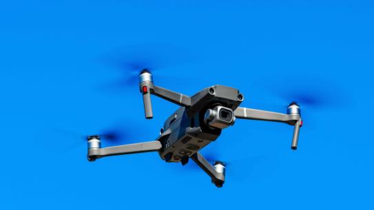 Drone with a blue sky background