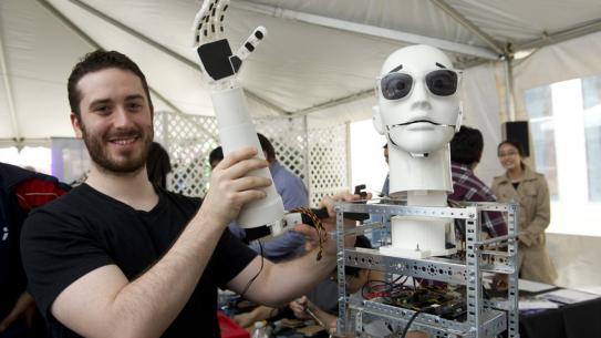 Grad student with Caesar robot