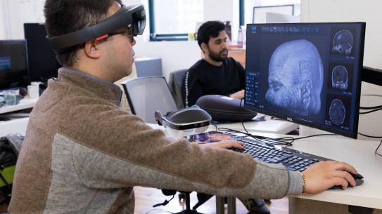 Man looking through VR headset at Digital Future Lab