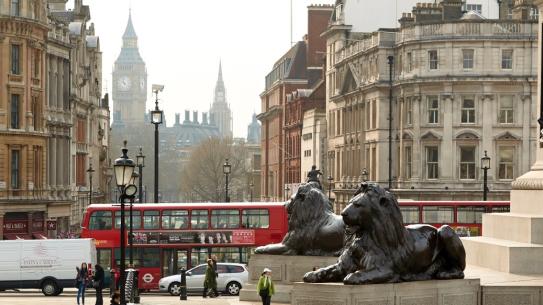 London city scene with red double decker bus