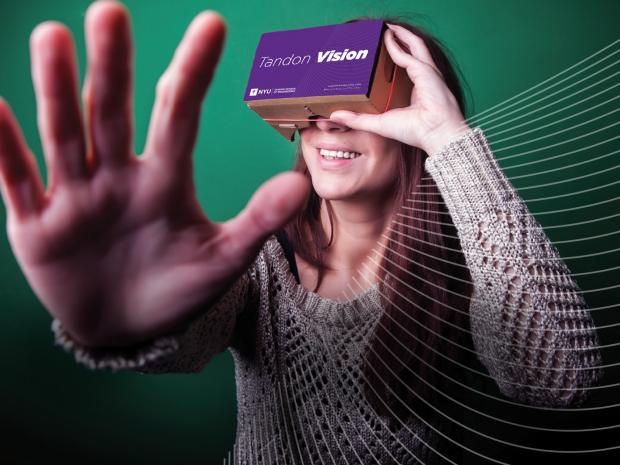 Student using a Cardboard Virtual Reality Headset