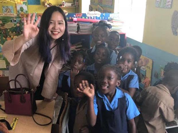 Tandon student with young school children in uniform