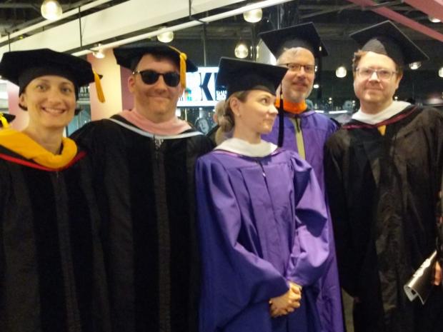 group of faculty in academic gowns