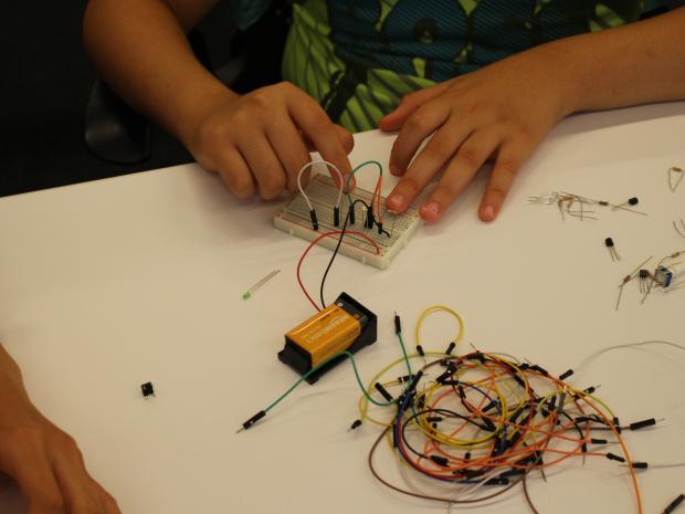 Student working with a breadboard