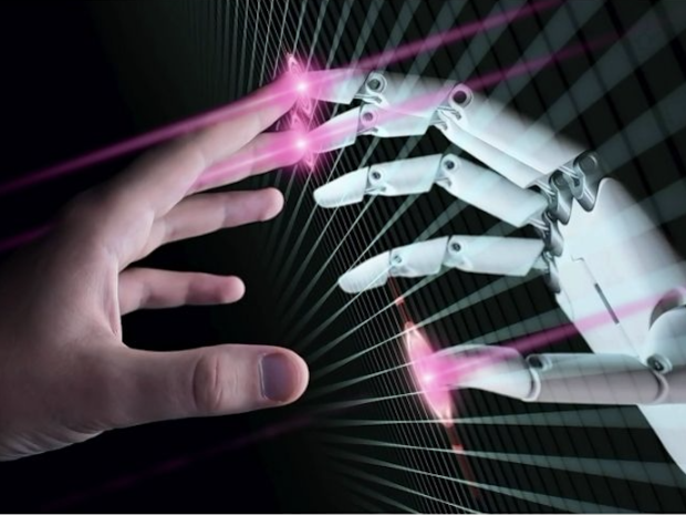 a human hand touching a robot hand at the finger tips