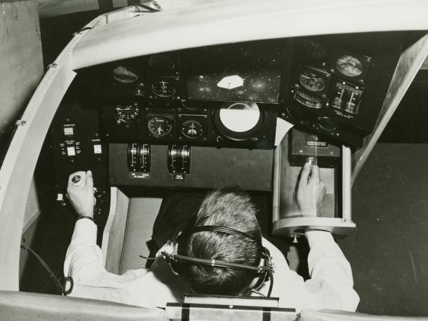 arial view of man sitting in practice cockpit