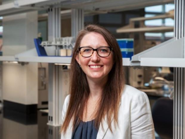 Headshot of Whitney Stoppel, in lab setting