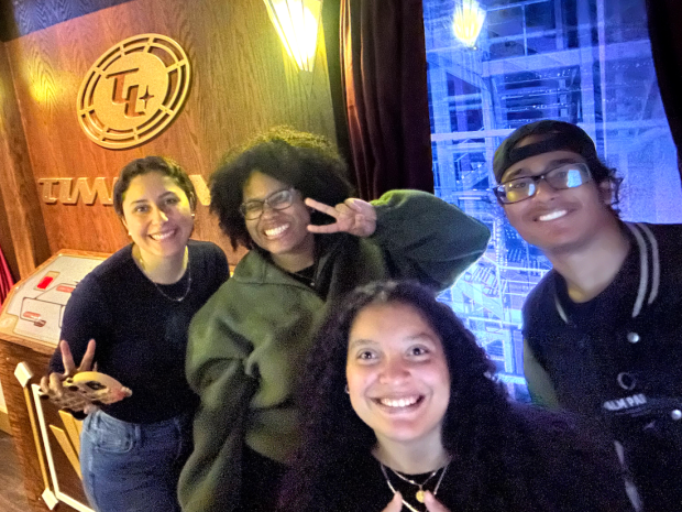 group of diverse smiling students at social event