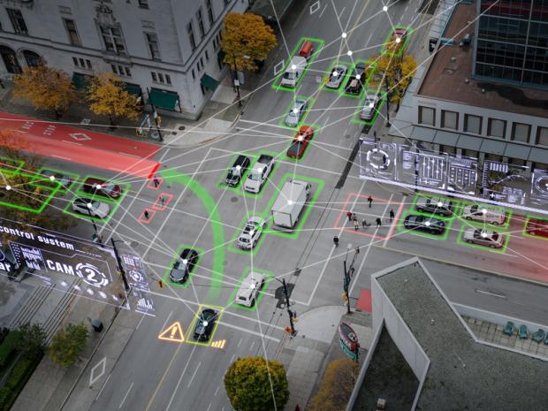 an overhead view of buy city intersection with AI data superimposed