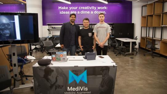 Members of MediVis showcase their product that merges medical visualization with augmented reality. From left: CEO Osamah J. Choudhry, Engineering Wenbo Lan, and intern Eric Barenrodt.
