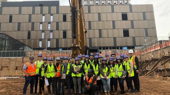 Photo of students at the construction site 