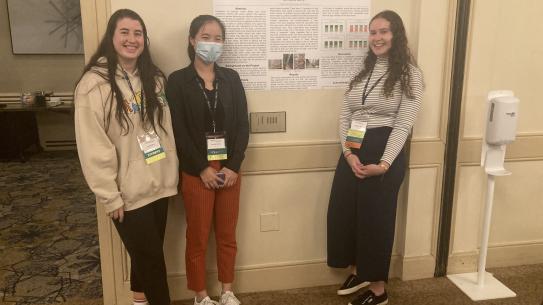 3 students posing infront of a poster titled "The Effect of Vegetal Element on Perceptions of Safety for Urban Pedesptians"