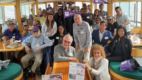 Guests posing together on the NYU Military Alumni Veterans Cruise