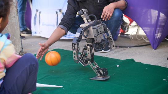 a robot kicking a ball