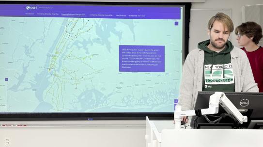 Calvin Kuhnen, Reese Conti, and Abdul-Halim Hussein presenting a map of NYC.