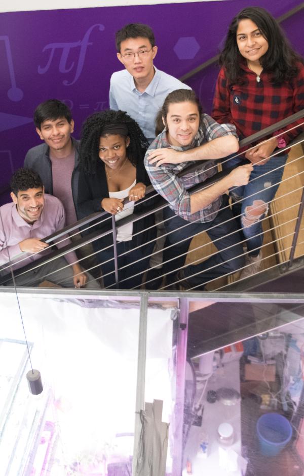 diverse group of students on MakerSpace stairwell