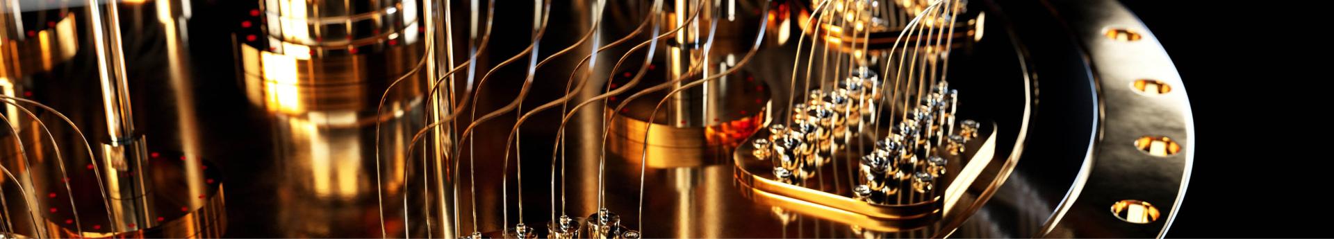 Interior mechanism of a quantum computer showing gold-plated stages, vertical copper wiring, and intricate connections against a dark background