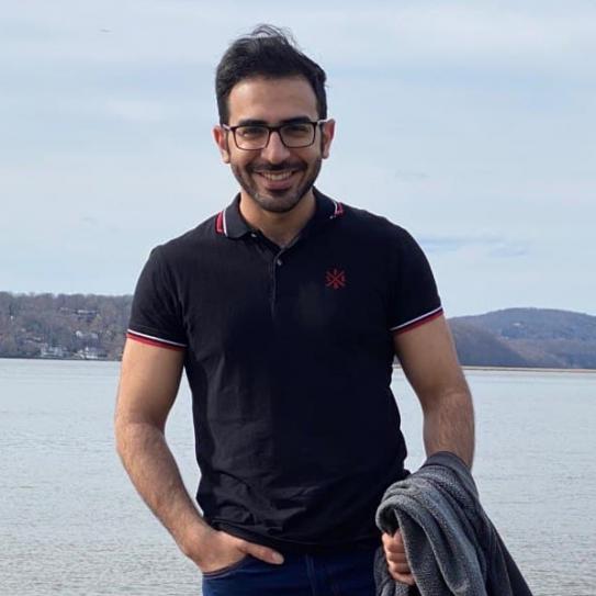 A photo of Sarmad Mehrdad with Hudson river in the background
